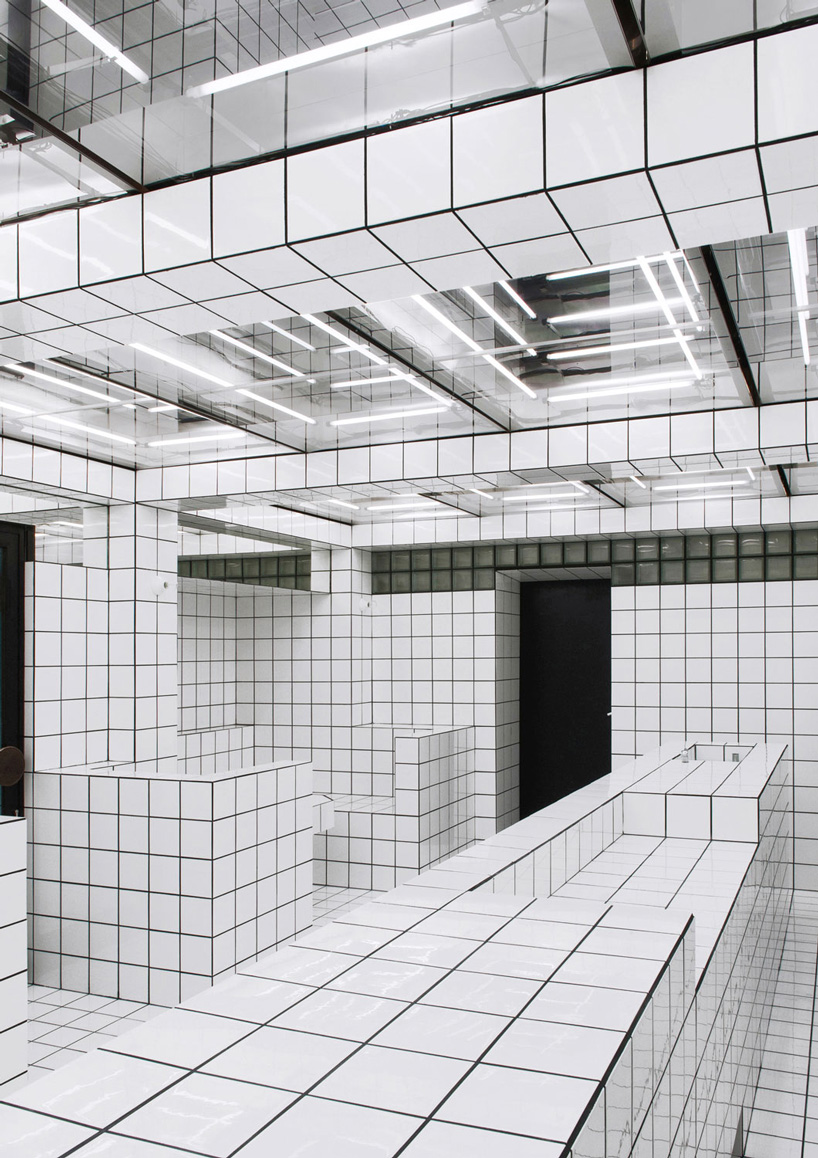 artist-designed LAX bar is built as a walk-in social sculpture of ceramic tiles, mirrors + neon