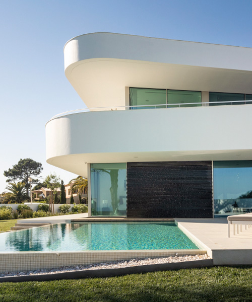 lux mare houses by mário martins are 'two autonomous pieces that complement one another'