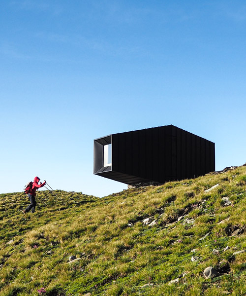 the black body mountain shelter frames alpine views in dormillouse, italy