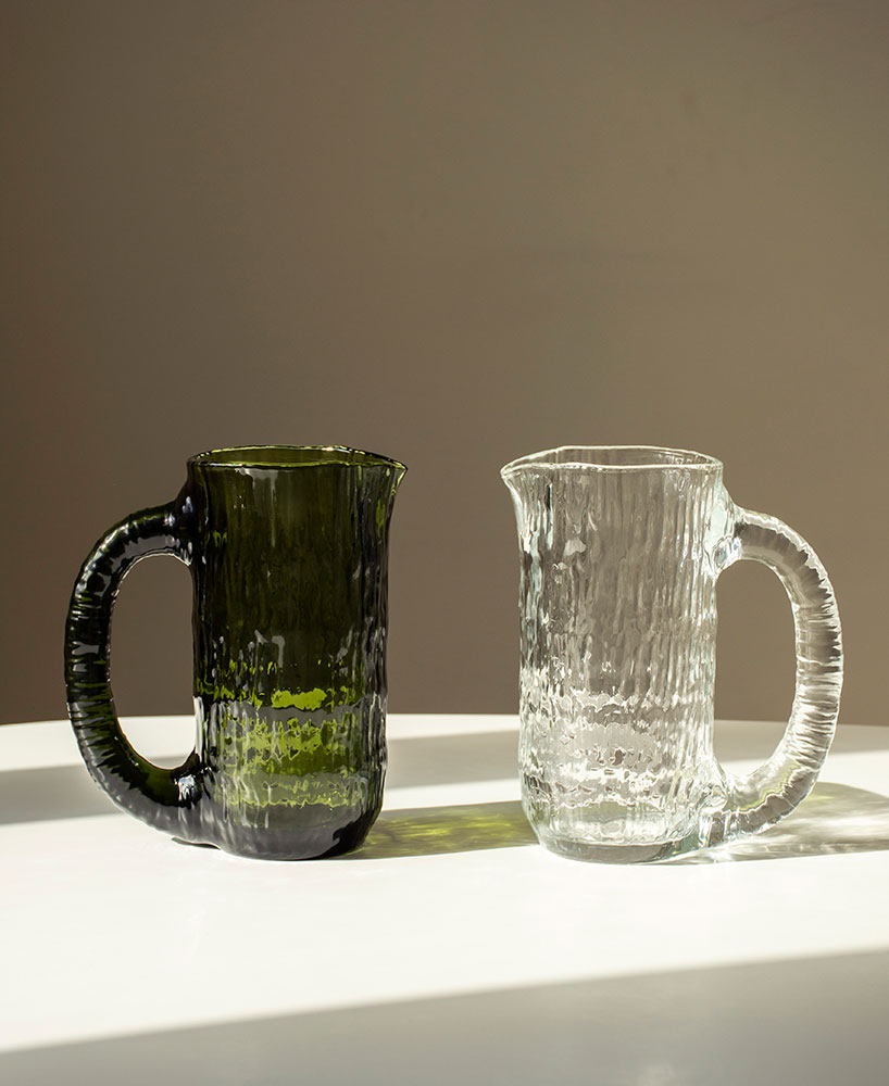 jin kuramoto sculpts intricate ice-like glass water jug for nedre foss