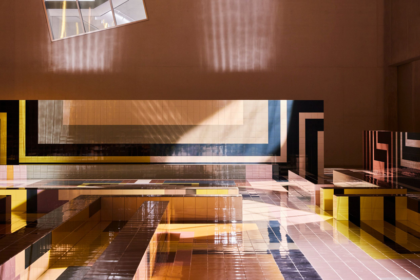OMA/AMO creates geometric runway decked in ceramic tiles for prada's SS20 show