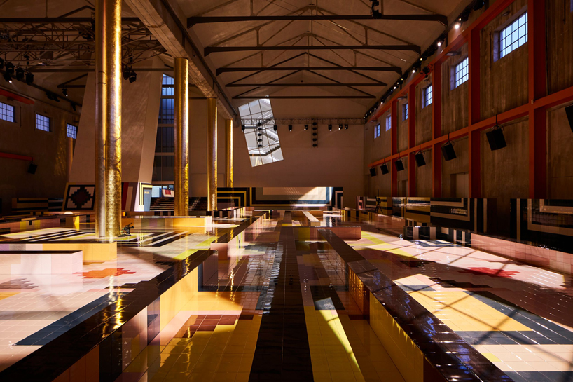 OMA/AMO creates geometric runway decked in ceramic tiles for prada's SS20 show