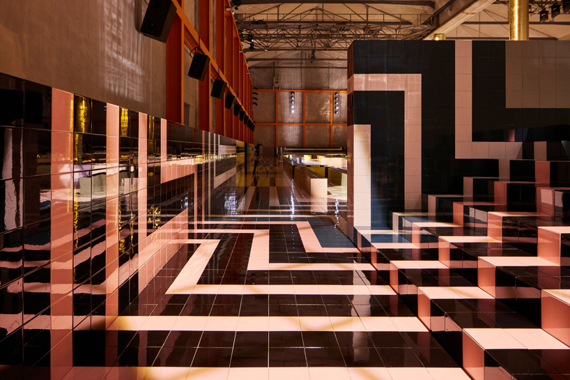 OMA/AMO creates geometric runway decked in ceramic tiles for prada's SS20 show