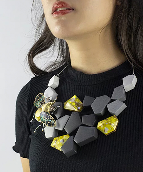 insecta iridesse is an intricate jewelry series made almost entirely from paper