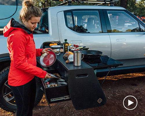 rivian adds pull-out kitchen option to its electric pickup-truck camper