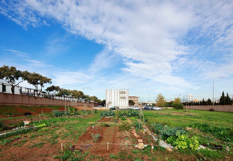 SMS arquitectos wraps high school extension with patterned façade in mallorca