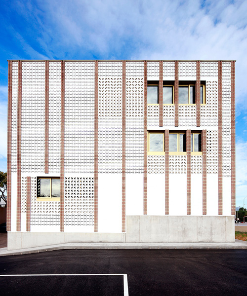 SMS arquitectos wraps high school extension with patterned façade in mallorca