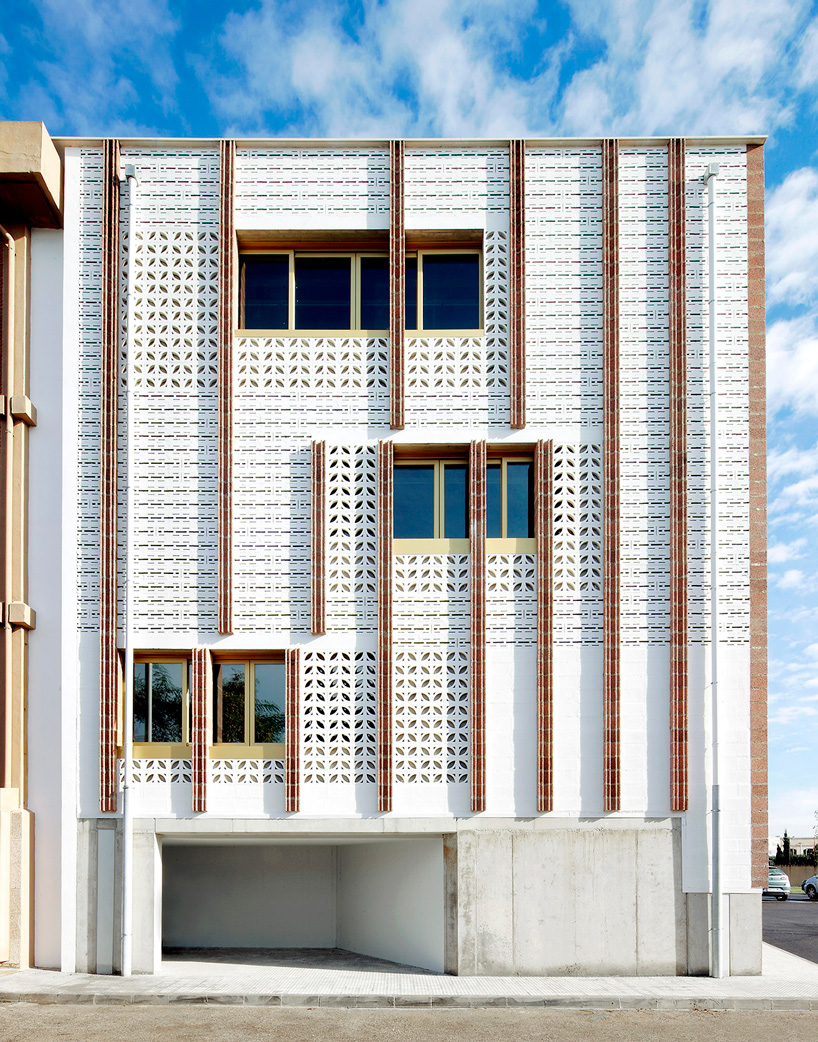 SMS arquitectos wraps high school extension with patterned façade in mallorca