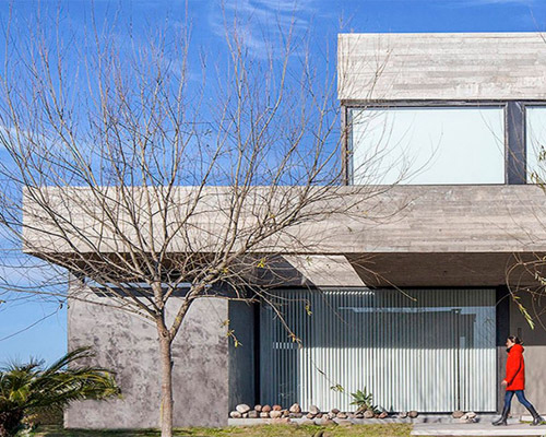 SL architects builds exposed concrete volumes for root house in buenos aires