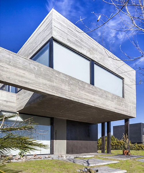 SL architects builds exposed concrete volumes for root house in buenos aires