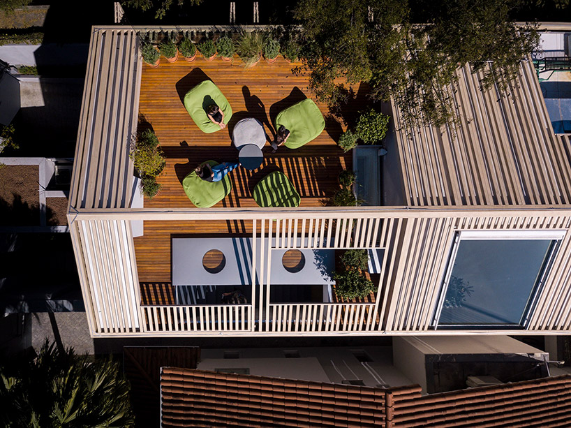 studio AG completes house for young couple with gable roof in sao paulo
