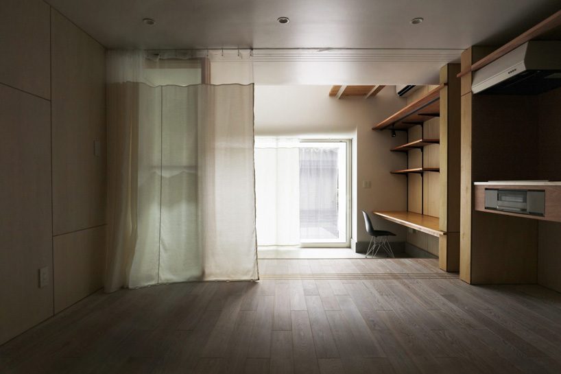 sugawaradaisuke combines living space + community café in 'light surface house' in tokyo