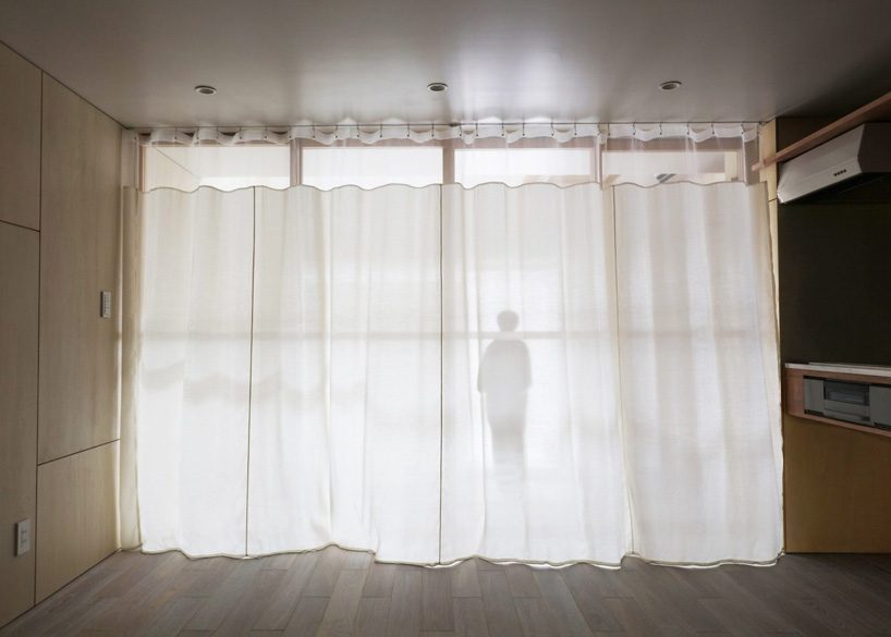 sugawaradaisuke combines living space + community café in 'light surface house' in tokyo