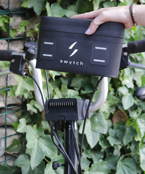 hand-held 'swytch kit' turns regular bikes into electric