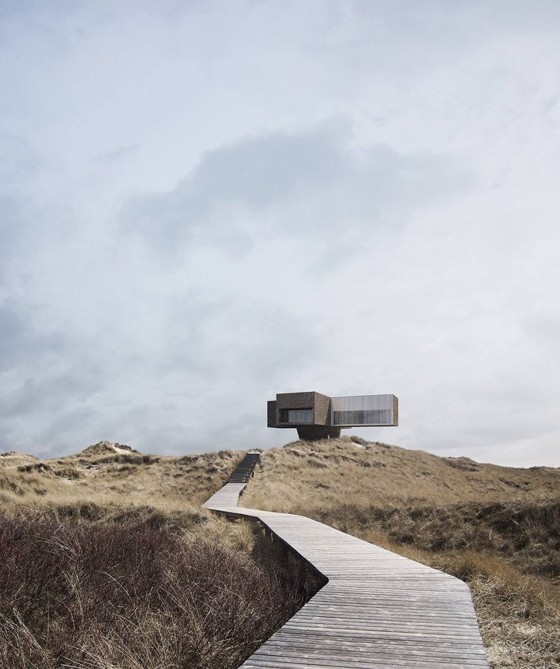 cantilevered 'dune house' by studio viktor sørless sits on the edge of ...