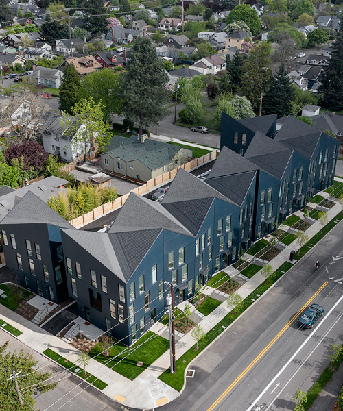 waechter architecture tops residential block in oregon with sculptural origami roof