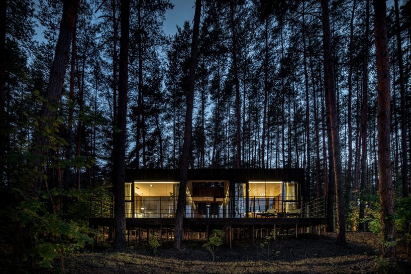 YOD group builds timber cabin with panoramic windows in ukrainian forest
