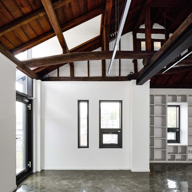 yong ju lee transforms 1930s wooden house into the hoehyeon community building in seoul