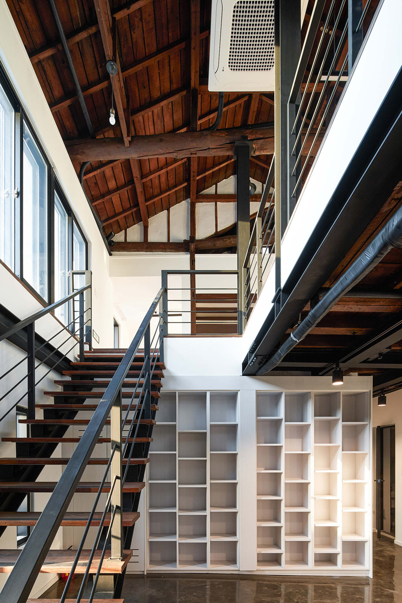 yong ju lee transforms 1930s wooden house into the hoehyeon community building in seoul