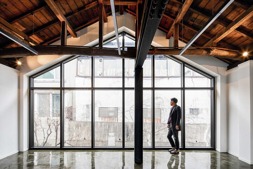 yong ju lee transforms 1930s wooden house into the hoehyeon community building in seoul
