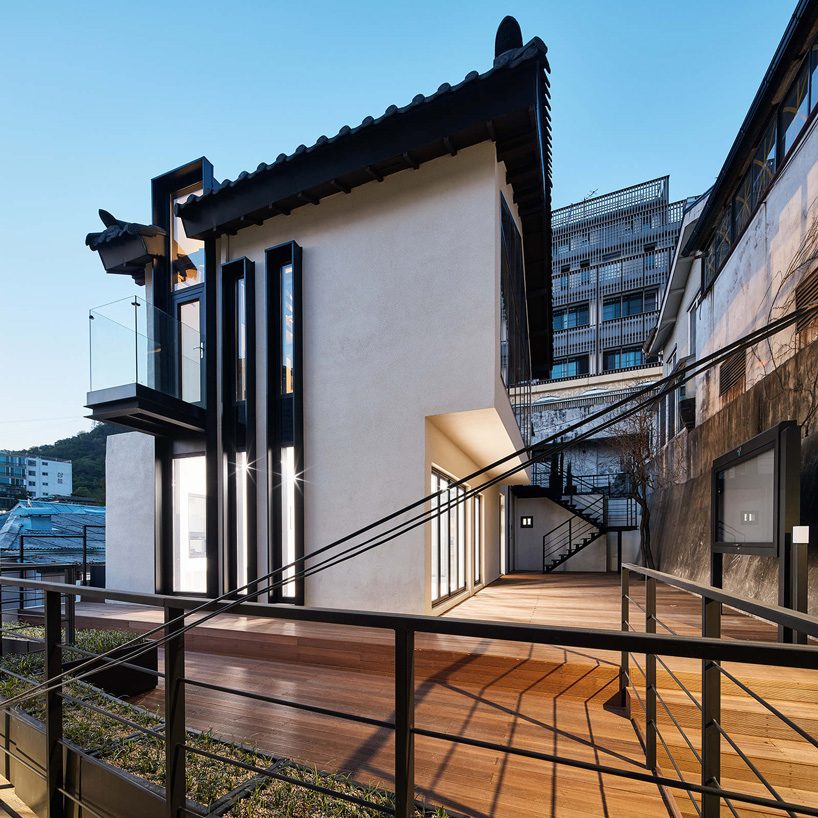 yong ju lee transforms 1930s wooden house into the hoehyeon community building in seoul