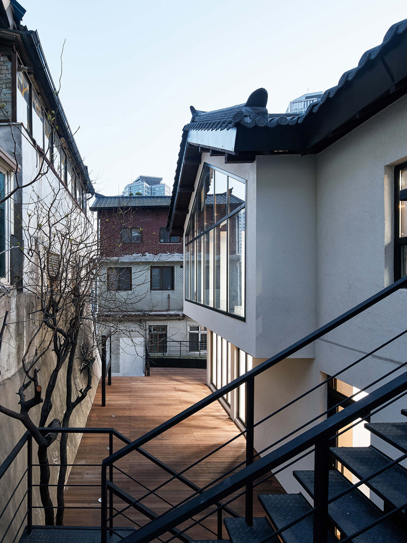 yong ju lee transforms 1930s wooden house into the hoehyeon community building in seoul
