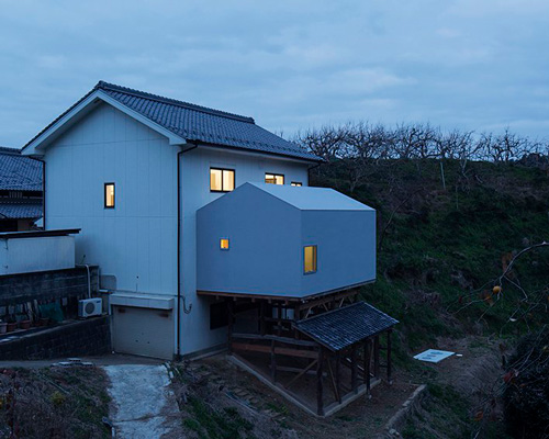 yusuke seki grafts new annex onto wooden structure of old house in japan