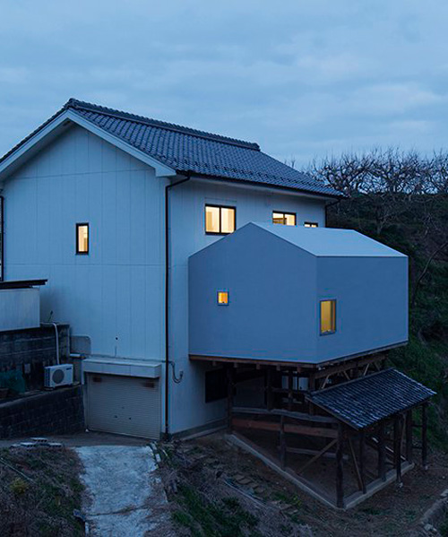 yusuke seki grafts new annex onto wooden structure of old house in japan