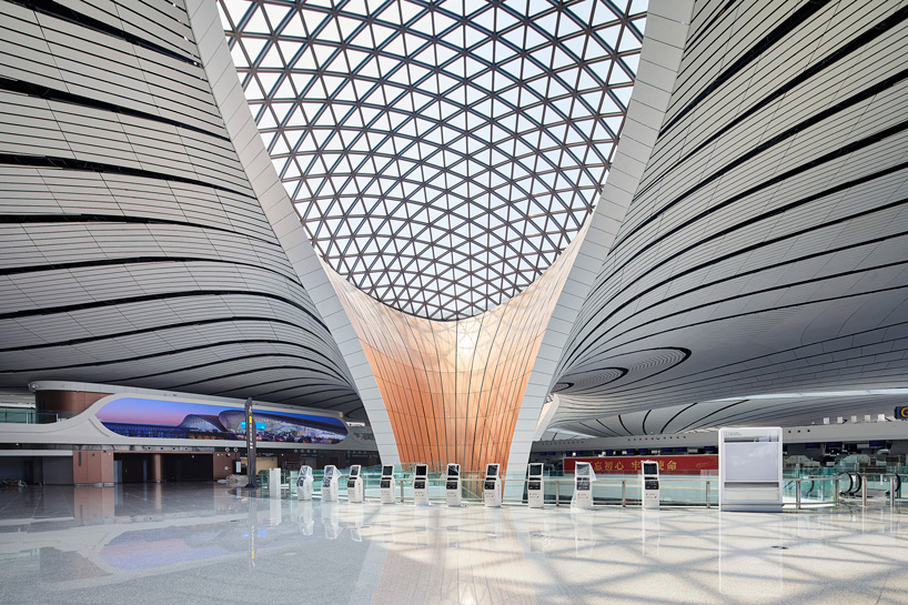zaha hadid architects' daxing airport with the world's largest terminal