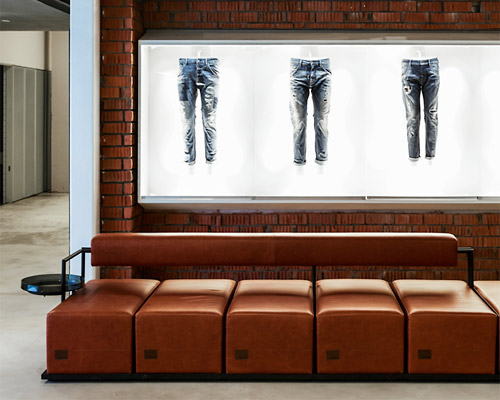 zoom.industries adds sleek interiors to industrial building for shanghai jeans brand