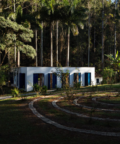 thirteen blue doors provide access to this bamboo art gallery in brazil