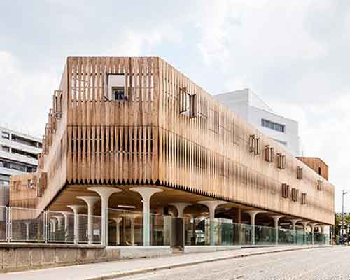 AAVP uses larchwood slats and aluminium sheets to clad student residence in paris