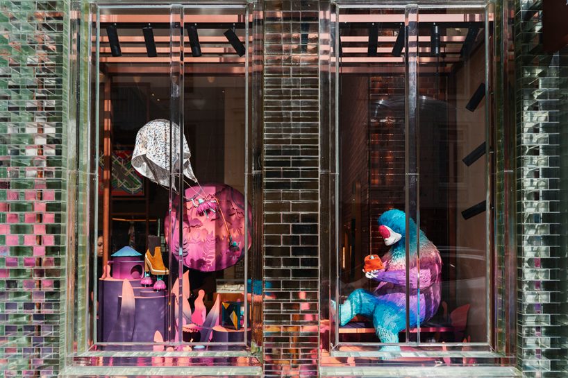 agnes and anthony creates dream-like paper art installation for hermès store in amsterdam designboom