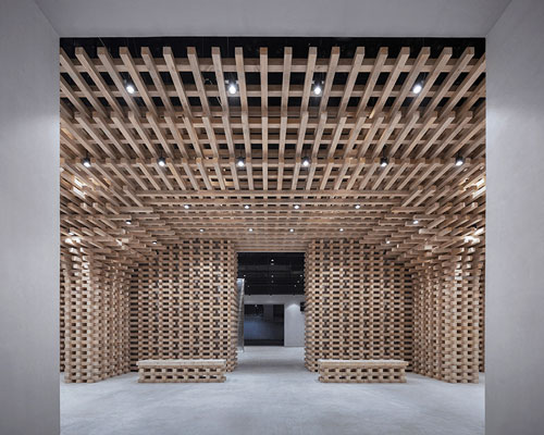 BANDe architects constructs a huge wooden structure for exhibition center in beijing