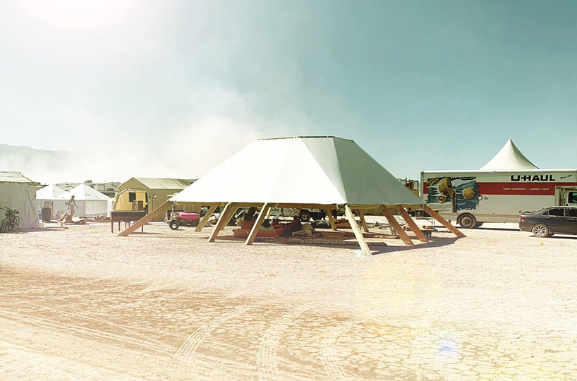 burning man pavilion gathers participants beneath framed views of the nevada desert sky