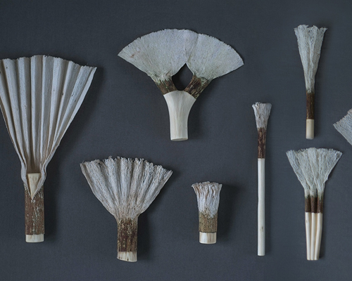 chialing chang uses flattened tree bark and barkcloth to create shelves, fans and brooms