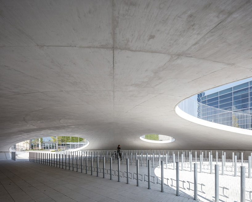 COBE architects' karen blixens plads is an urban plaza of bicycle hills ...