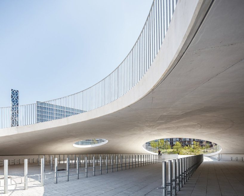 COBE architects' karen blixens plads is an urban plaza of bicycle hills ...