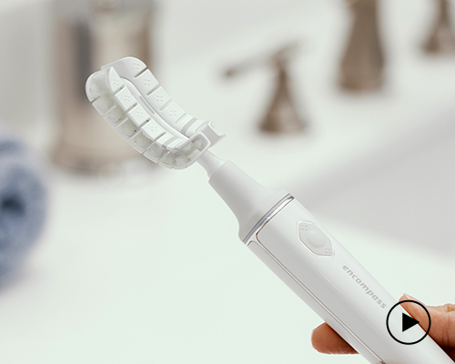 the encompass toothbrush uses a J-shaped head to clean teeth in 20 seconds