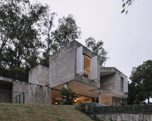 estúdio BRA's pitanga house sits within the rich native vegetation of santa isabel, brazil