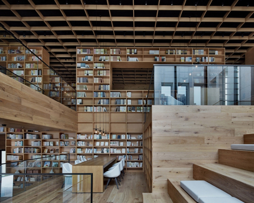 beijing fenghemuchen space design builds yue library as wooden forest of books in hangzhou