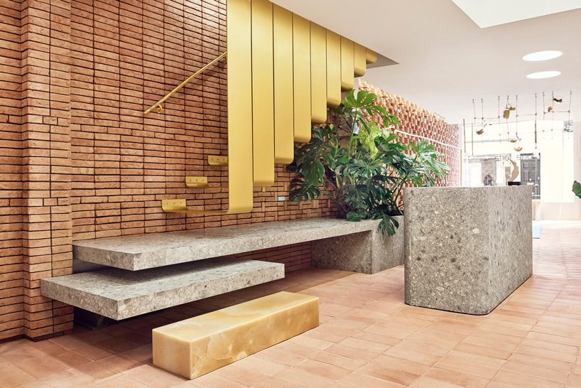 forte_forte combines brick, yellow onyx + brass in its latest boutique in london