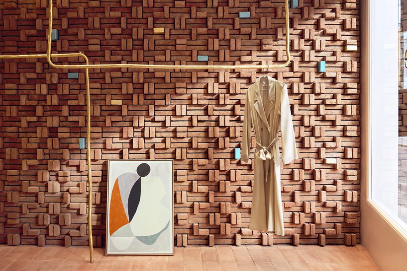forte_forte combines brick, yellow onyx + brass in its latest boutique in london