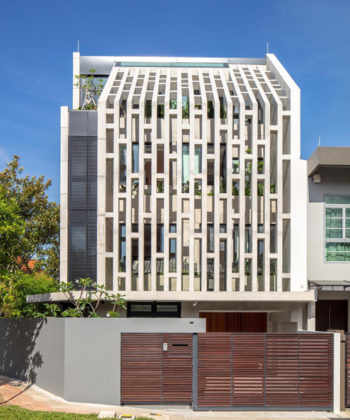 HYLA architects wraps singapore house in perforated screens of different patterns