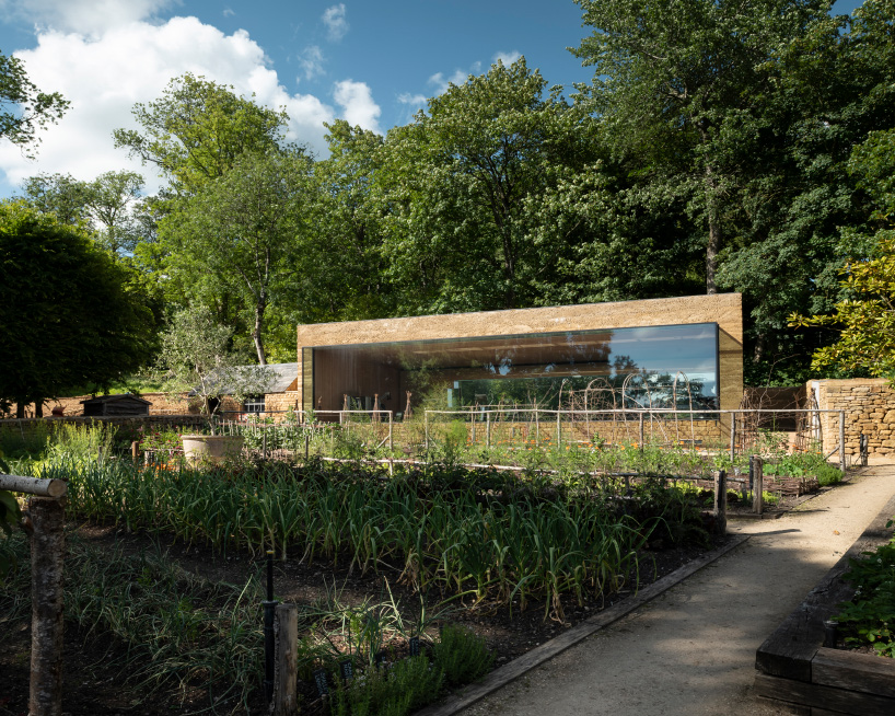 Invisible Studio Designs Hotel Gym Overlooking Productive Garden