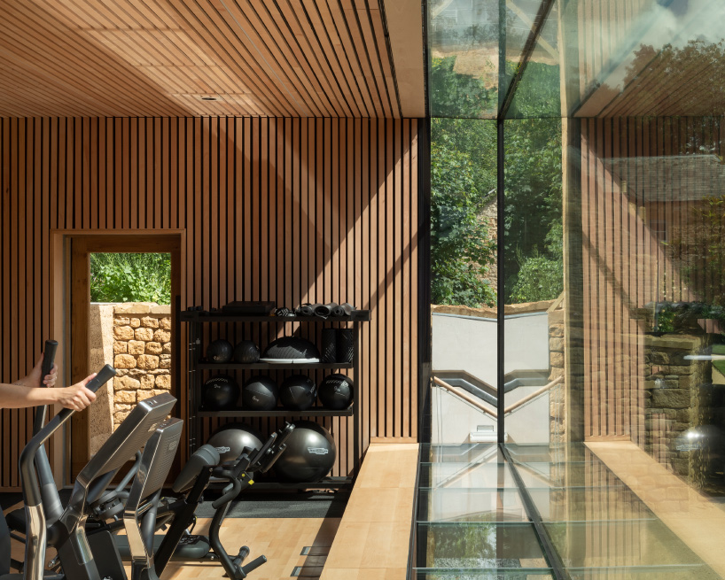 Invisible Studio Designs Hotel Gym Overlooking Productive Garden