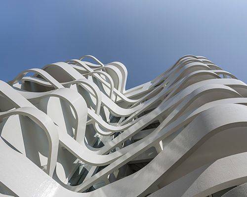 jean-pierre lott's 'le stella' tower expresses fluid, ribbon-like facade in monaco