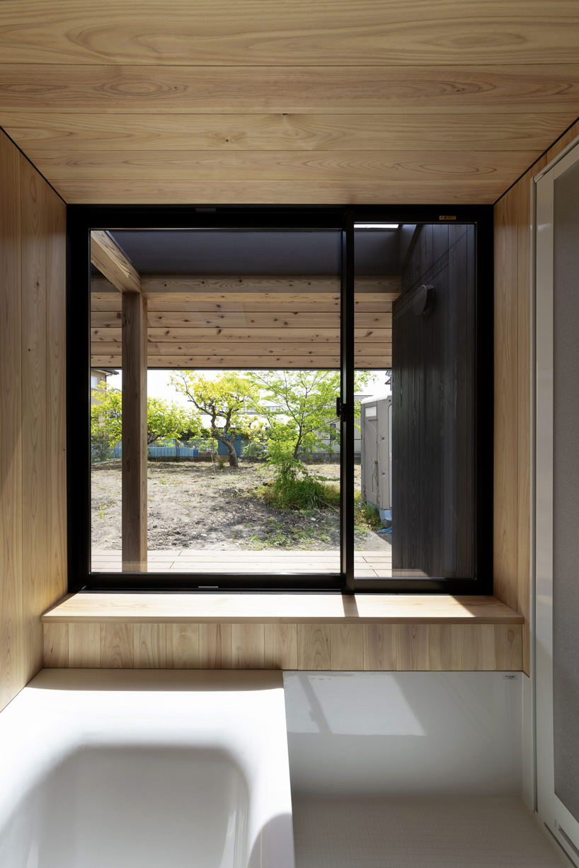 SN design architects builds house in kakegawa, japan, with a wooden frame and gable roof