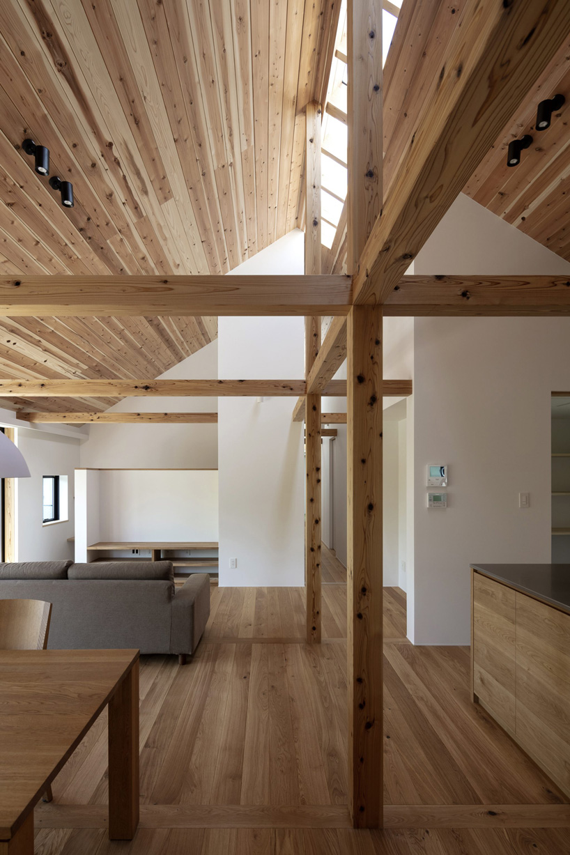 SN design architects builds house in kakegawa, japan, with a wooden frame and gable roof