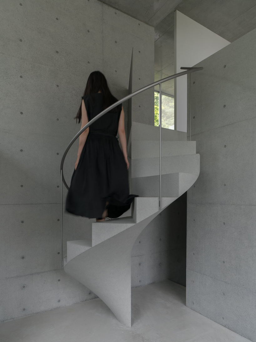 kazunori fujimoto architects completes house in ashiya, japan, with concrete spiral staircase